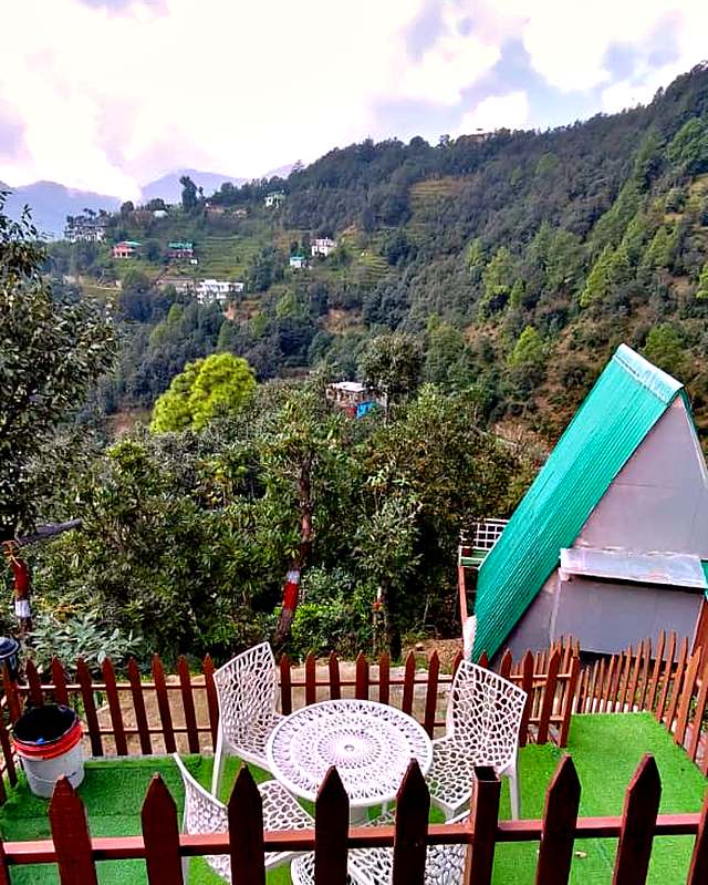 Forested hills seen from the garden of The Rare One’s Resort near Mukteshwar